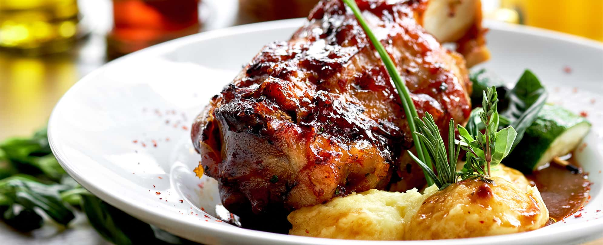 A BBQ meat and potatoes dish in a bowl at Gettin' Basted, a Branson, Missouri restaurant.