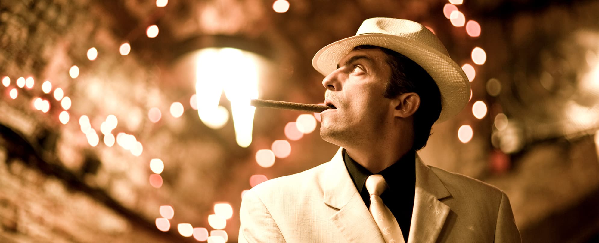 A gentleman in a hat with a cigar in his mouth, from the Mob Museum in Las Vegas, Nevada. 